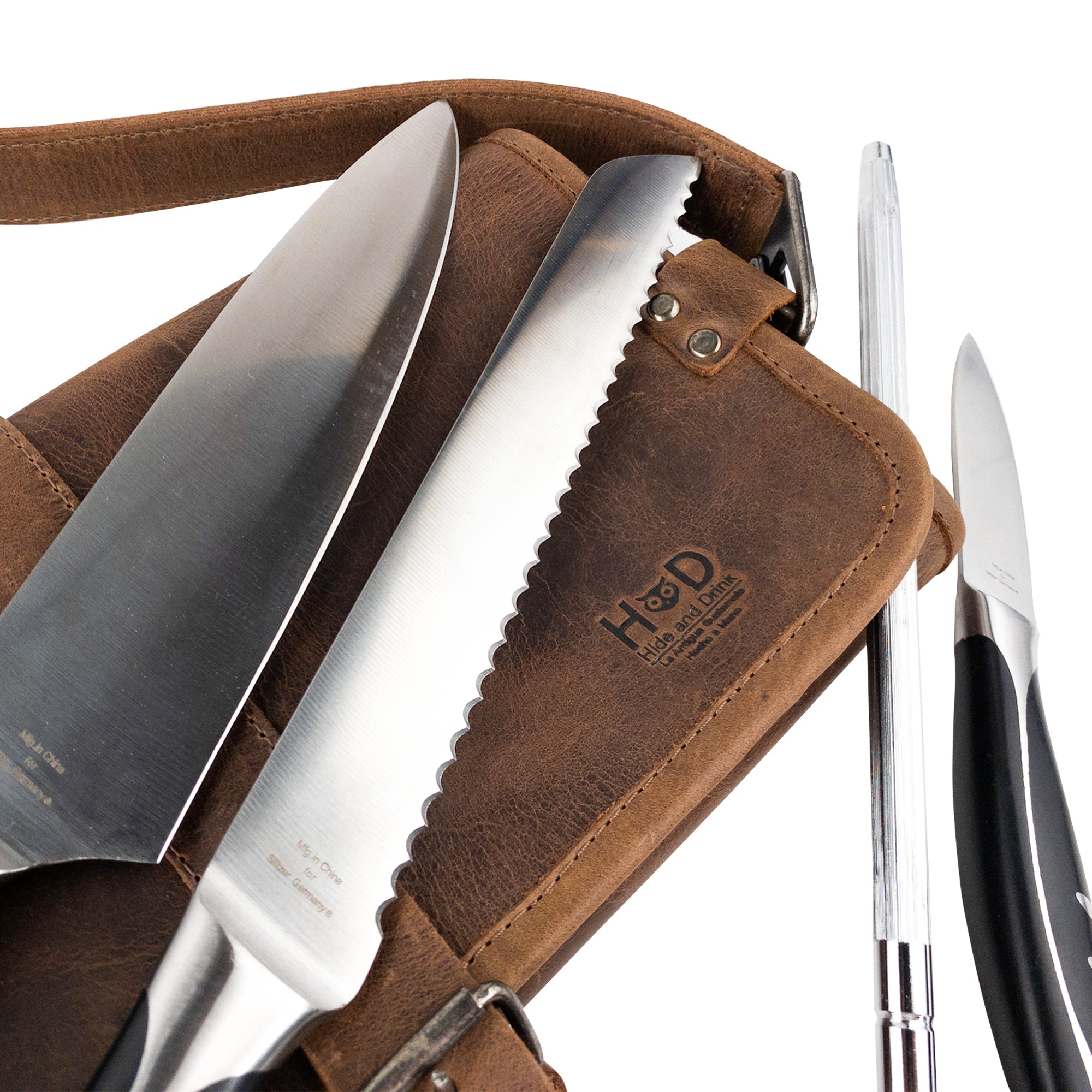 Hide & Drink Knife Roll With Water Resistant Lining (8 Pockets) in a travel-friendly setting. This practical Chef's Knife Roll Bag (8 Pockets) is an essential portable knife organizer for any chef.