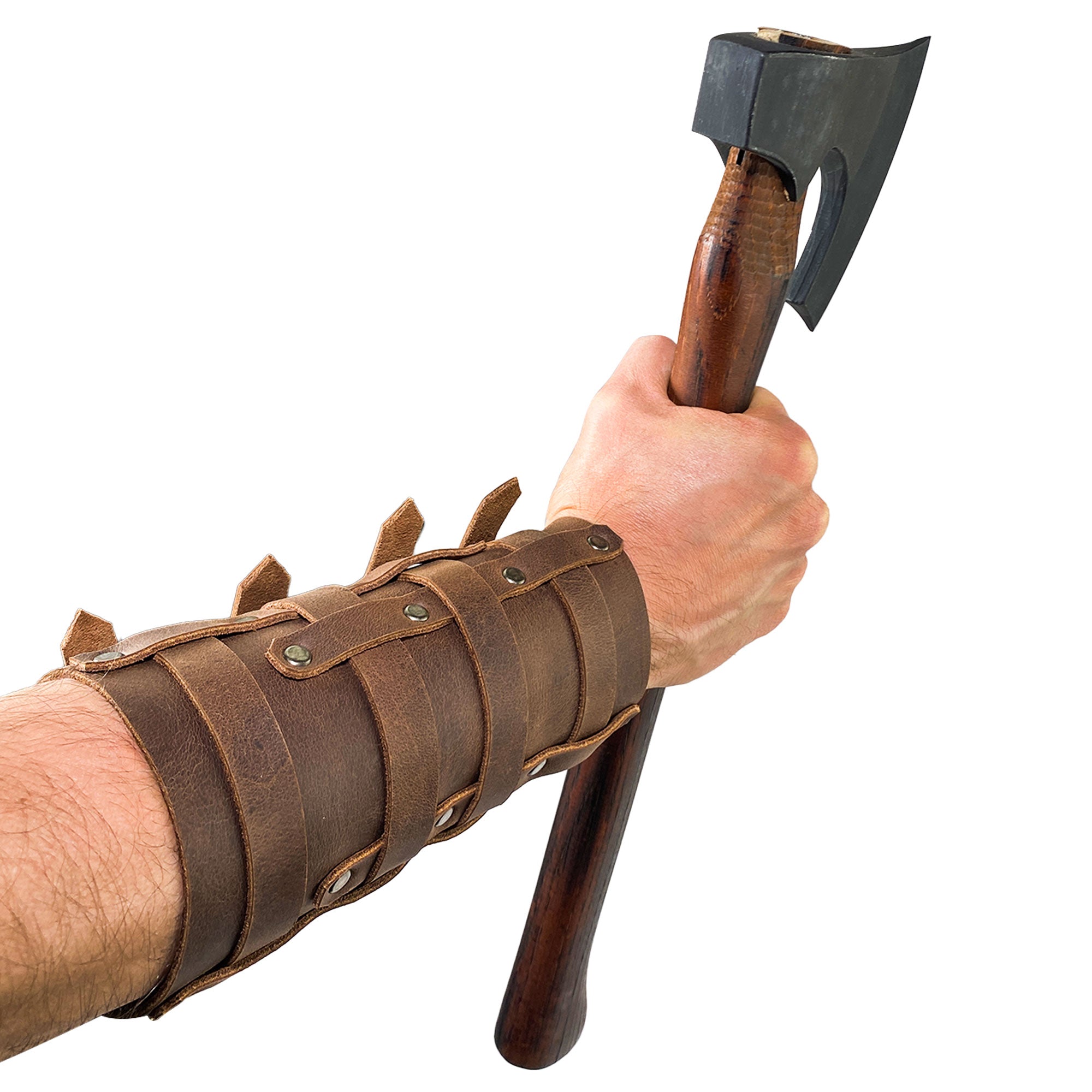 An image of the 4 Buckle Bracelet (2 Pack) by Valhalla Gear, depicting the wrist guard worn with a firm grip on an axe. This handmade full grain leather accessory, a part of StockyardX's artisan collection, combines functionality with medieval aesthetics, made in La Antigua Guatemala & Oaxaca Mexico.