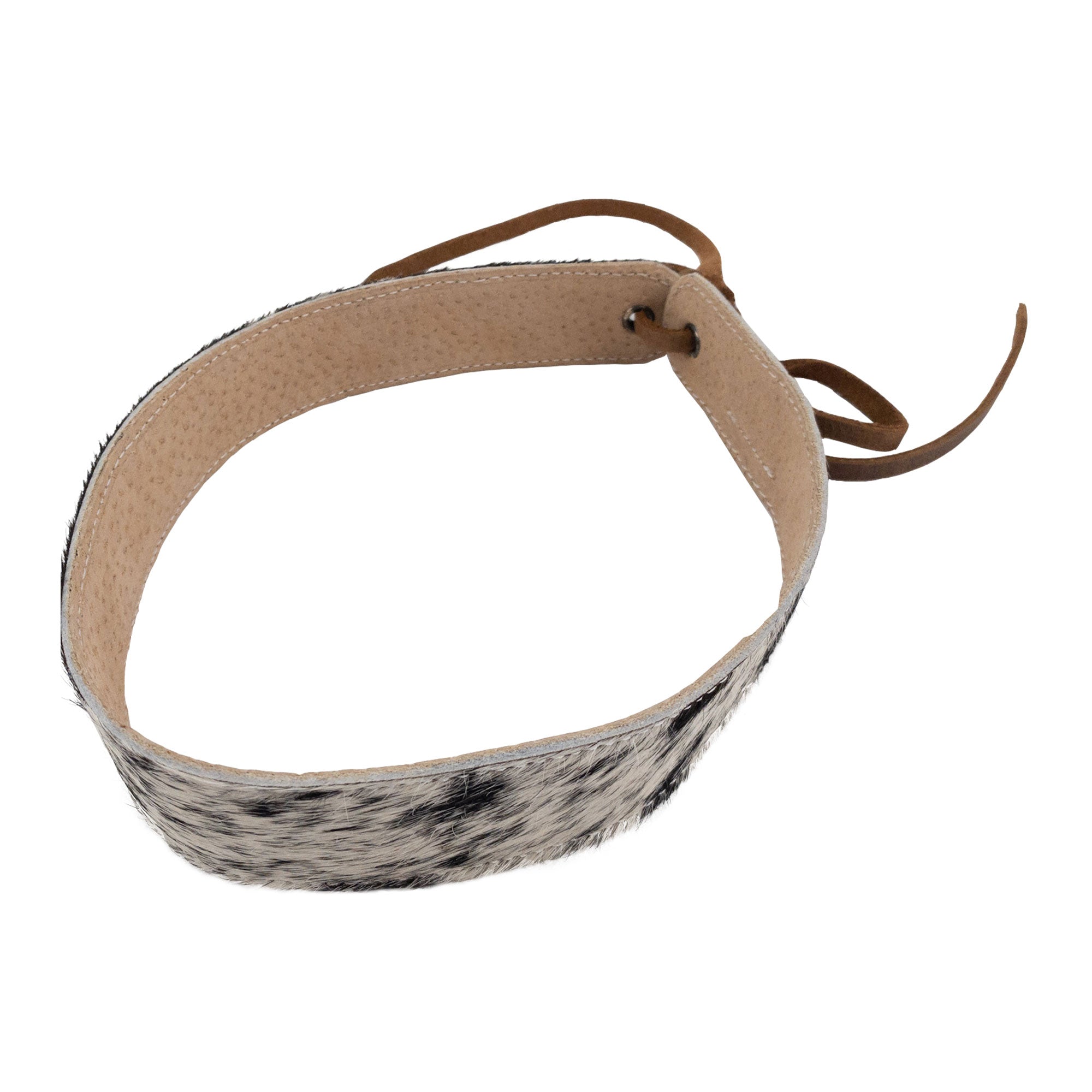 Unique Cowboy Hatband made from Hair-On-Hide Full Grain Leather designed by Western Leather Works. This adjustable hatband for cowboy hats combines rodeo style with artisanal elements, handcrafted in La Antigua Guatemala as part of a small batch production, featuring hand cut and hand sewn details, fire branded by skilled artisans.