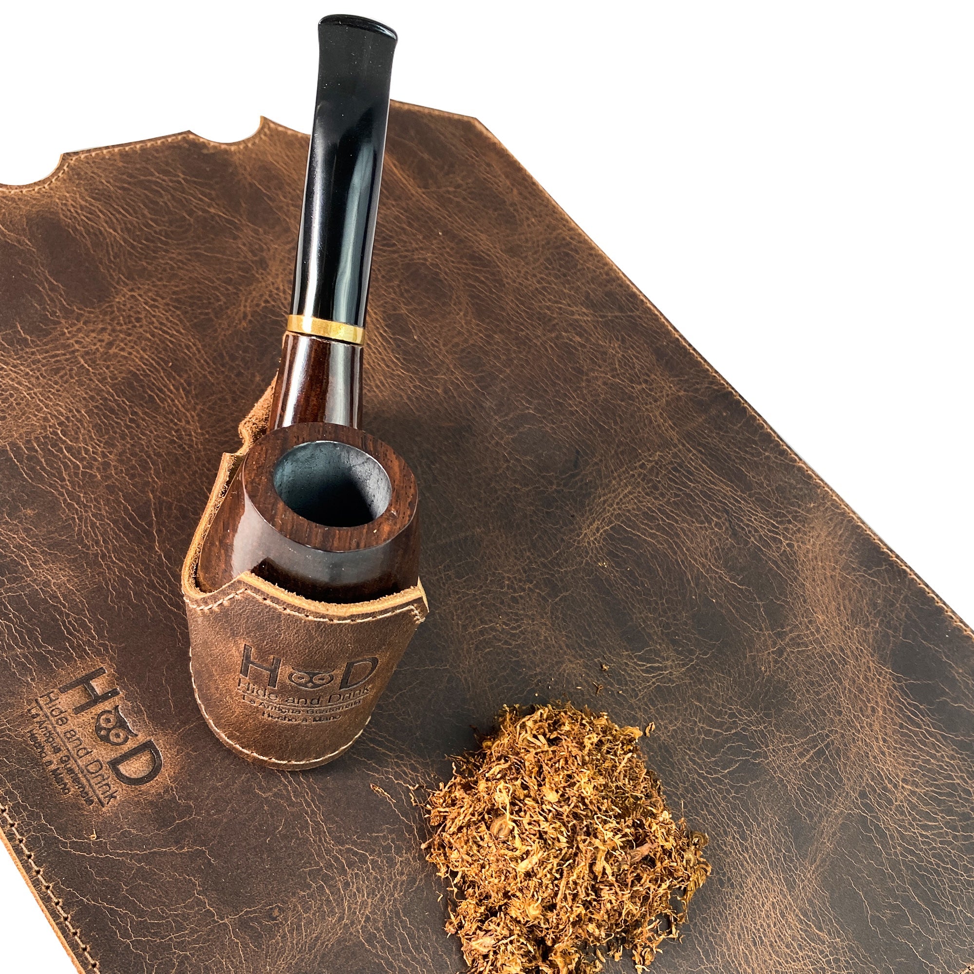 Dimensions of the Tobacco Pipe Holder by Hide & Drink with measurements labeled. This Tobacco Pipe Holder (Pipe not Included) features a portable & adjustable stand that is both functional and stylish. Manufactured from full grain leather through small batch production, it's a hand sewn artisan product made in La Antigua Guatemala & Oaxaca Mexico.