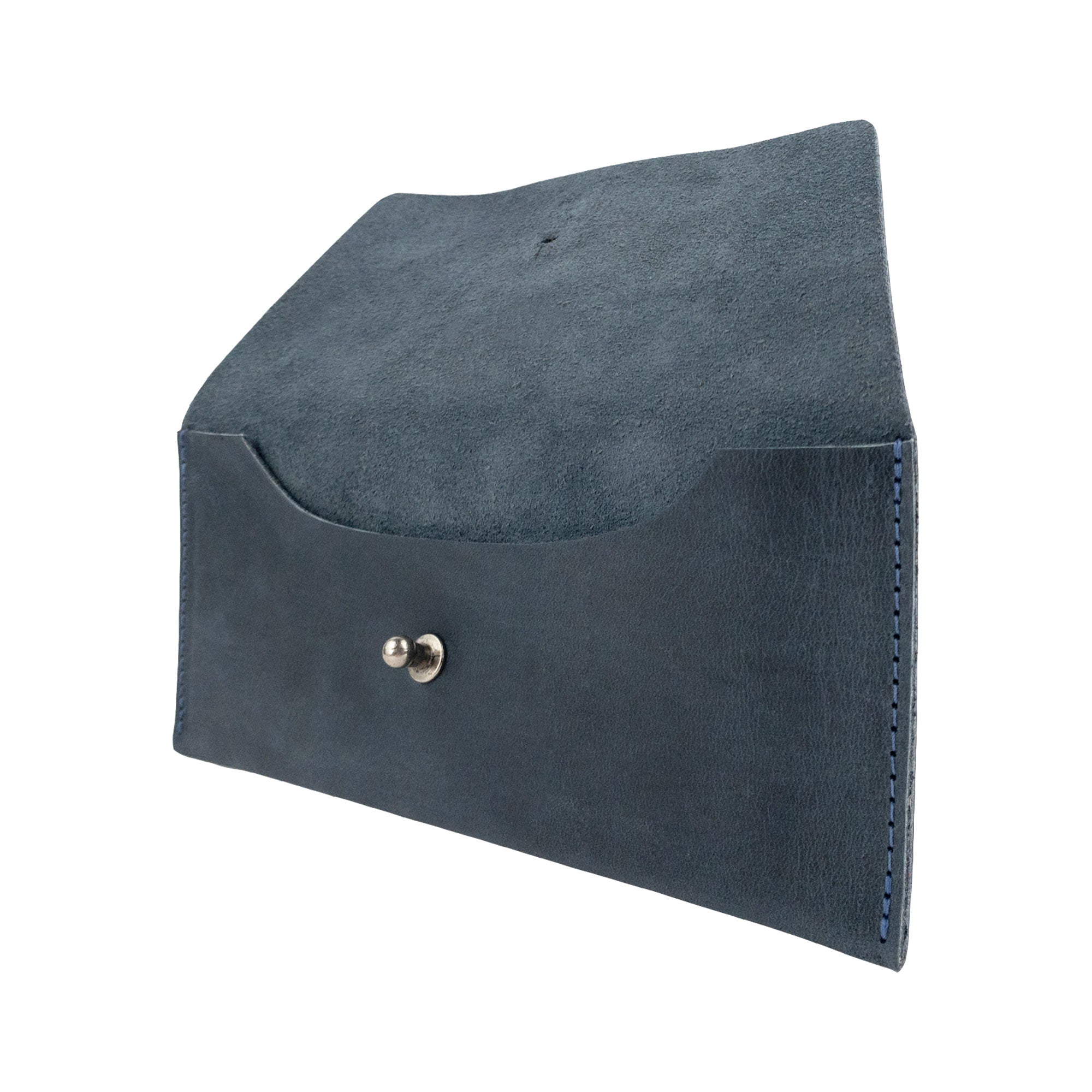 Side view of the maroon Long Utility Pouch by Hide & Drink, highlighting its handmade details and chic design. Ideal for everyday storage of cash and coins.