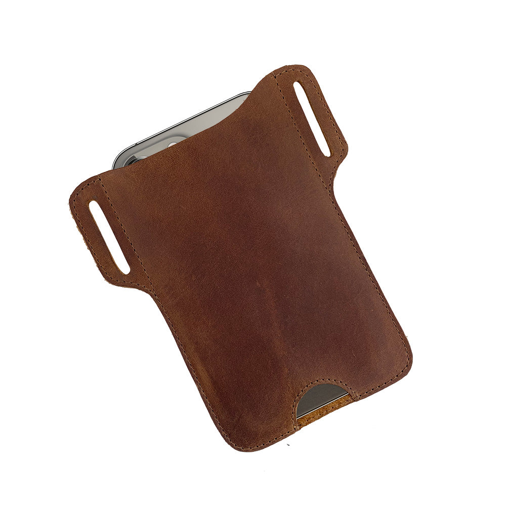 Top view of the Hide & Drink Tactical iPhone 13/14 Pro Case with an iPhone inside, displaying its snug fit and rustic style. This case is handcrafted from premium full grain leather, ideal for protecting your iPhone 13/14 Pro Max.