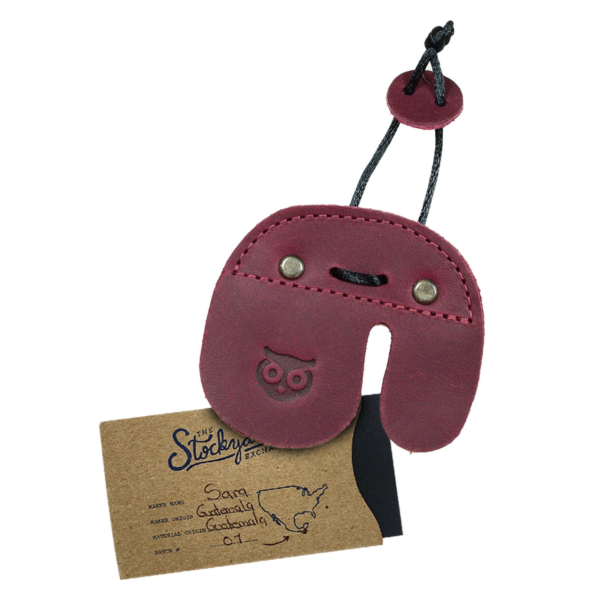 The Hide & Drink Left Handed Archery Finger Protector displayed in a dynamic pose for shooting context. This Archery Finger Tab acts as your Protect Guard for Recurve Bows, providing an elegant and functional piece from high-quality Full Grain Leather for your shooting practice gear. Artisan-crafted by StockyardX, it showcases dedication to quality.