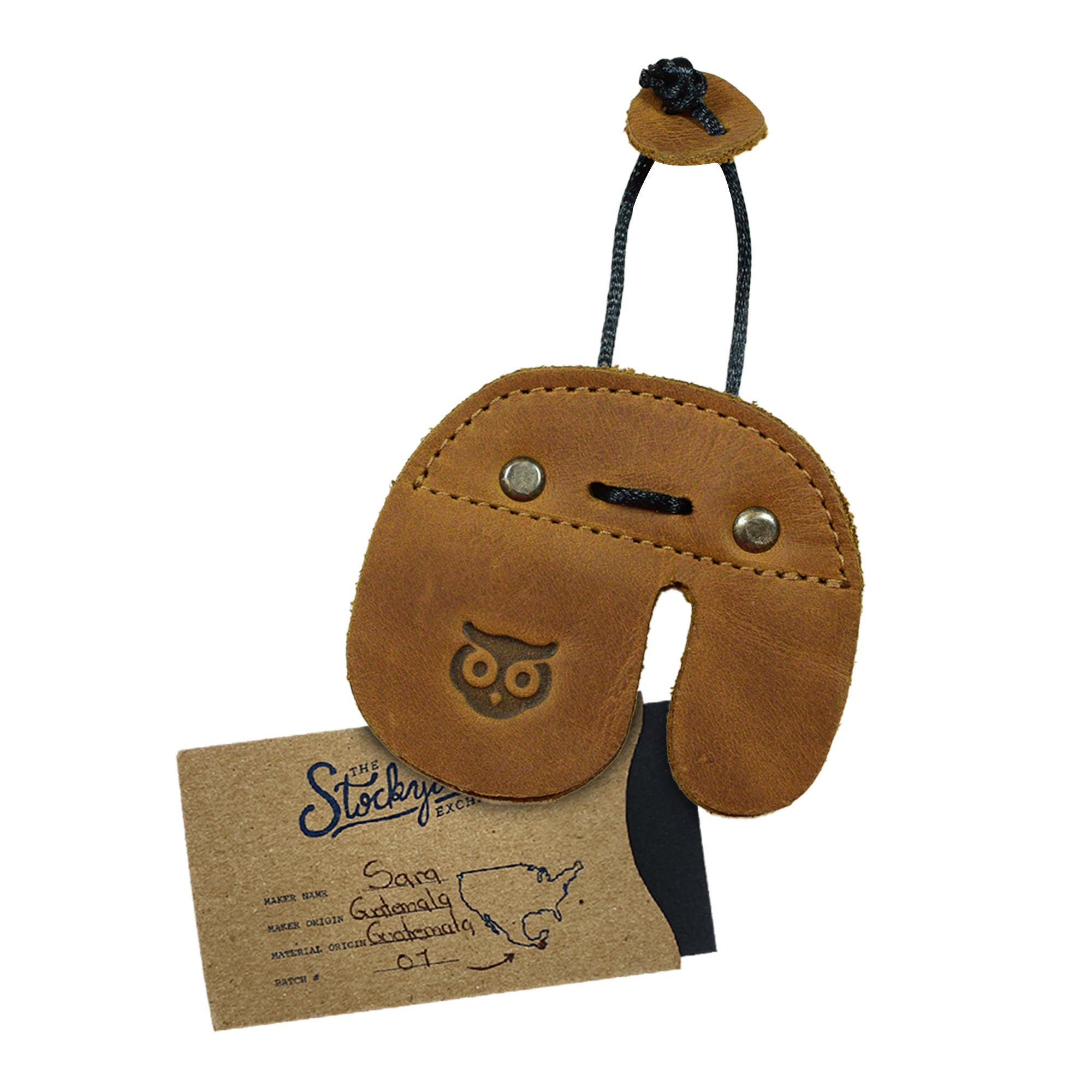 The Hide & Drink Left Handed Archery Finger Protector displayed highlighting its unique design. This Archery Finger Tab is an essential Protect Guard for Recurve Bows, crafted from rich Full Grain Leather. Ideal for shooting practice gear, it represents StockyardX's artisan commitment to quality and small batch production.