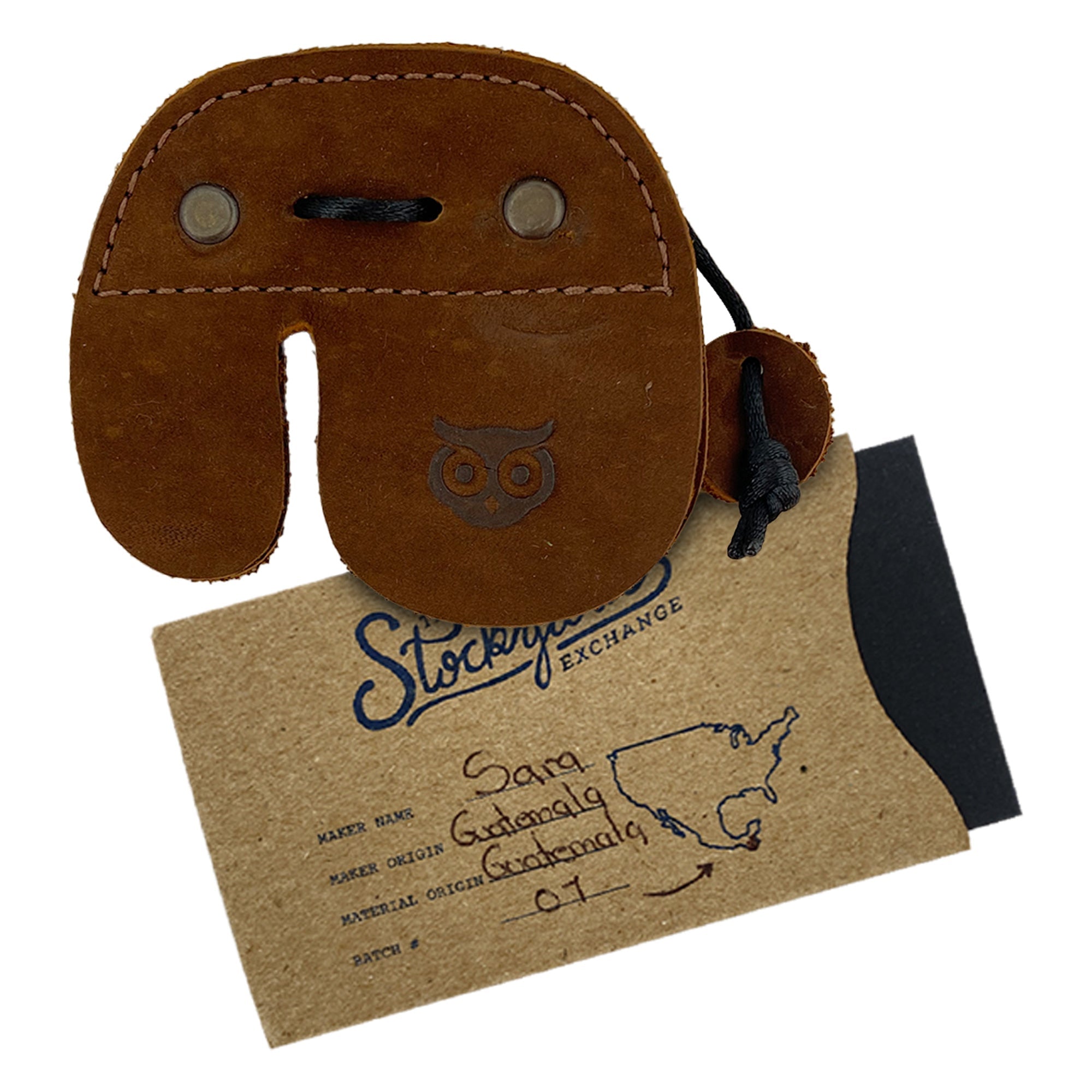 Right Handed Archery Finger Protector by Hide & Drink, a beautifully crafted archery finger tab using full grain leather. This stylish finger protector ensures optimal protection as a guard for recurve bows, enhancing your shooting practice gear sports & outdoors. Artisan craftsmanship shines through in its hand cut and hand sewn detail, reflecting small batch production and fire branding, handmade in La Antigua Guatemala.