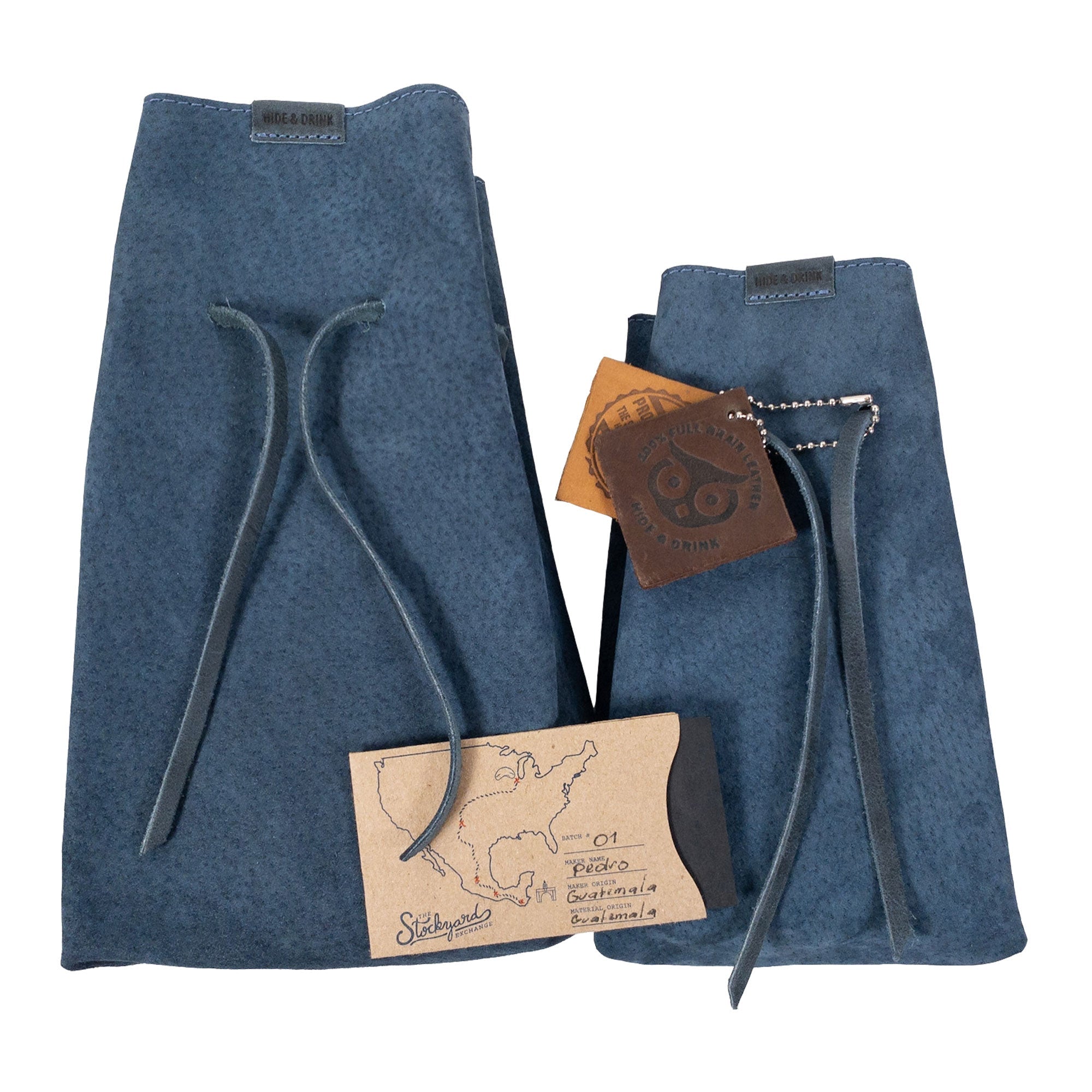 Hide & Drink's Drawstring Sack (2 pack) in a warm tone, perfect for stylishly keeping essentials secure, great for gifting. Drawstring Sack (2 pack) Handmade from Sheepskin and Full Grain Leather, StockyardX, Small Batch Production, Hand Cut, Hand Sewn, Fire Branded, Artisan, Handmade in La Antigua Guatemala & Oaxaca Mexico.
