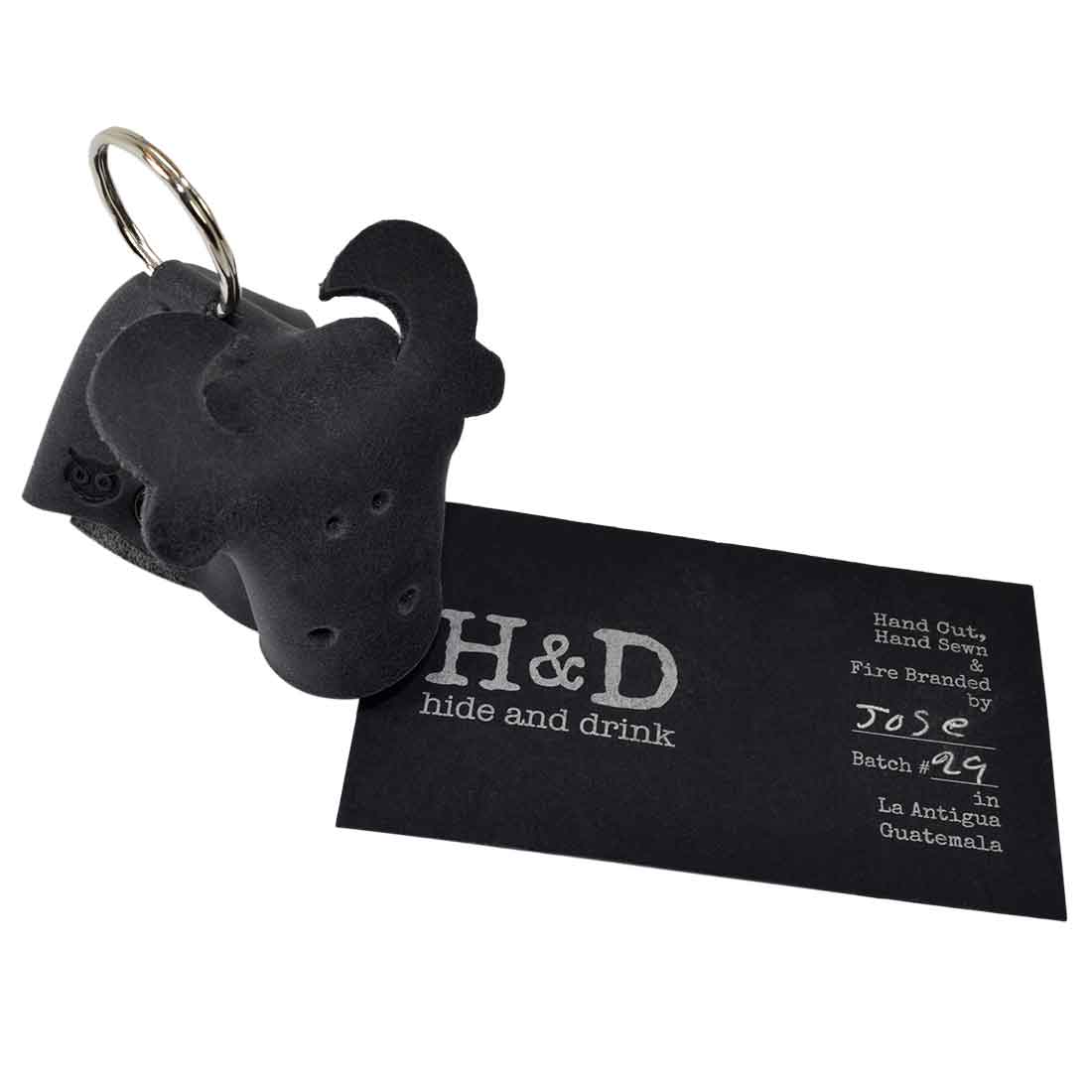 Distinctive Full Grain Leather Animal Key Chain from Hide & Drink, featuring a cow design. This Critter Keychain serves as a fun fob charm and a practical animal key holder charm pendant, crafted with attention to detail in small batches in La Antigua Guatemala.