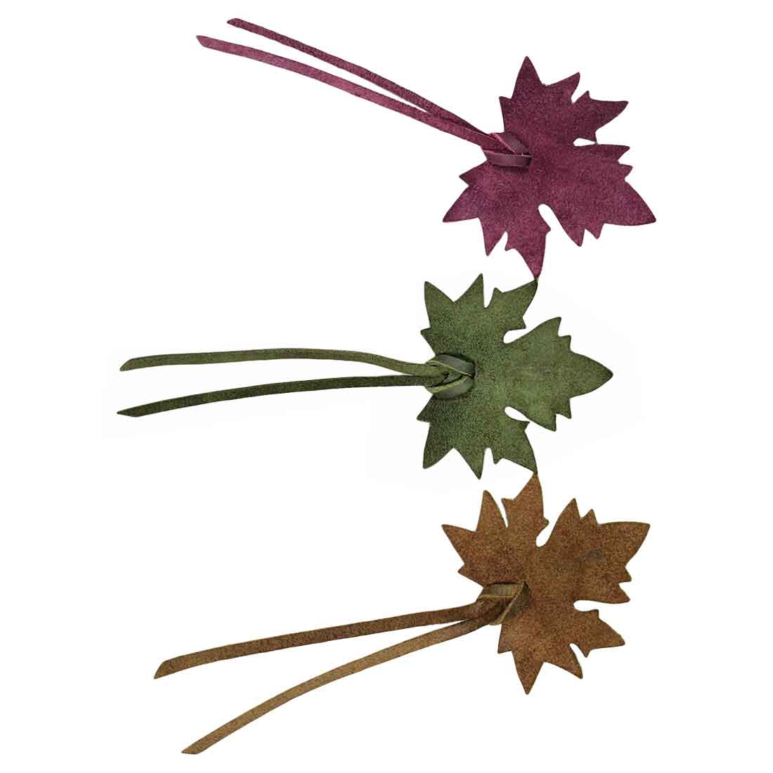 A group of three Autumn Bookmark (3 pack) by Hide & Drink, featuring maple leaf designs in autumn colors, perfect for bookworms seeking cute accessories. These bookmarks are artisan-crafted from full grain leather, making them a thoughtful gift for book lovers. Autumn Bookmark (3 Pack), Bookworm Gifts, Cute Accessories, Small Batch Production, Hand Cut.