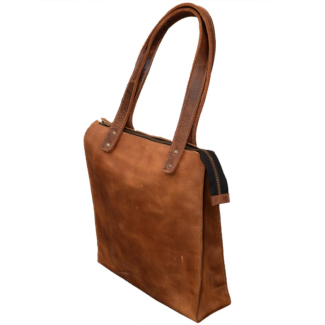Side profile of the Square Shoulder Bag by Hide & Drink, emphasizing its sleek design and quality full grain leather construction. Ideal for daily outings, this handbag showcases the beauty of handmade craftsmanship with fire branded accents and represents artisan skills from La Antigua Guatemala & Oaxaca Mexico.
