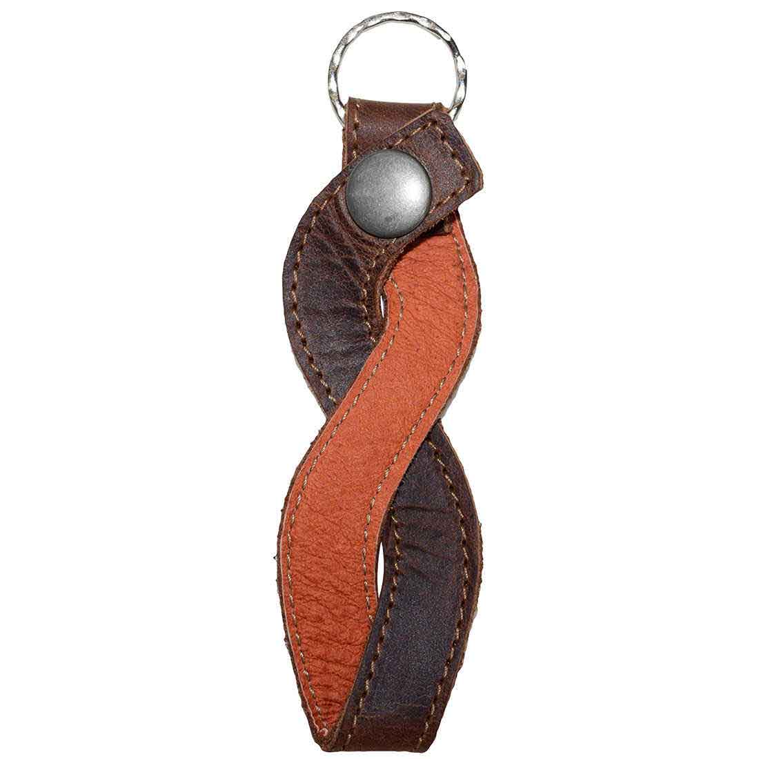 Close-up view of a vintage Braided Keychain by Hide & Drink, showcasing its hand sewn craftsmanship in full grain leather, perfect for stylish key holders and accessories.