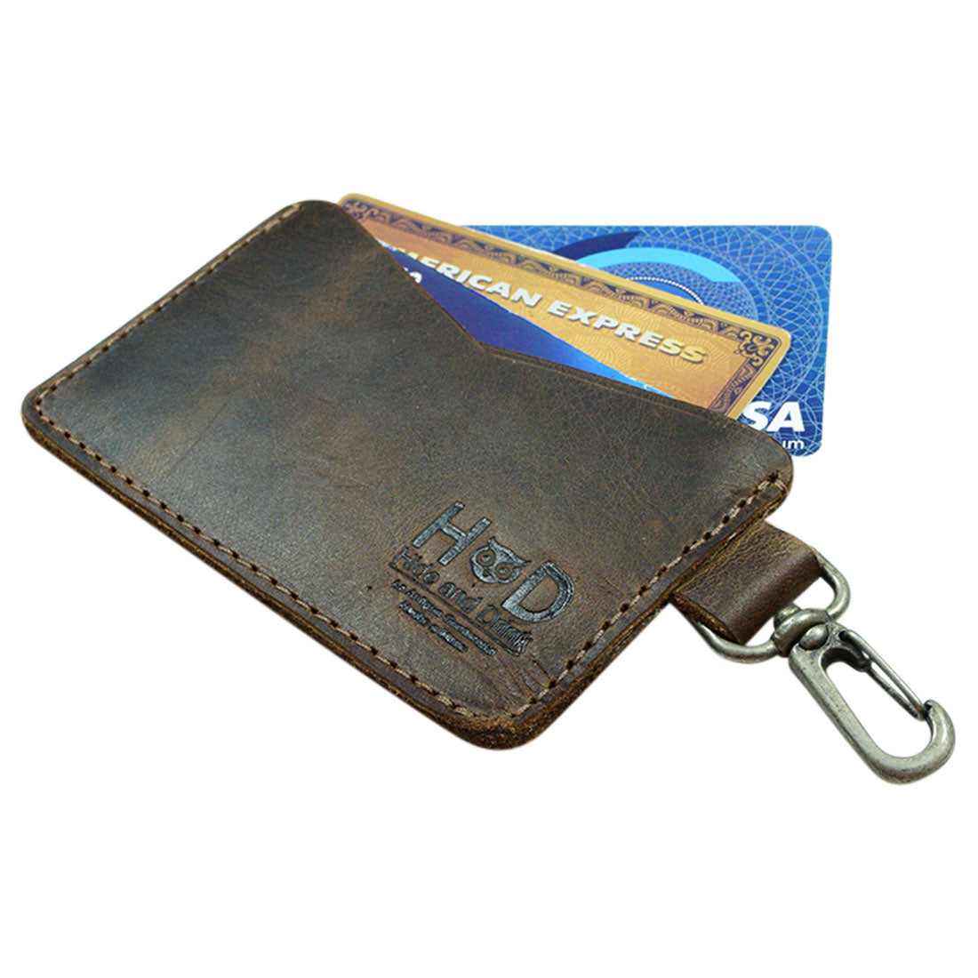Front view of the Leather Card & Key Holder by Hide & Drink, designed to hold up to 4 cards. This versatile Keychain Organizer is made from Full Grain Leather and features a lobster clip. Its artisan craftsmanship shines through with every hand cut and hand sewn detail, embodying small batch production principles. Handmade in La Antigua Guatemala & Oaxaca Mexico.