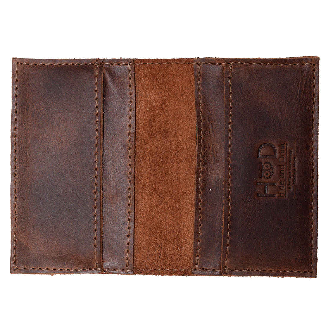 Bifold Horizontal Card Wallet by Hide & Drink displayed from the outside, highlighting its vintage look and durability, suitable for a minimalist traveller, organizer with capacity for multiple items, crafted from full grain leather, features small batch production, hand cut, hand sewn, and fire branded artistry, made by artisans in La Antigua Guatemala & Oaxaca Mexico.
