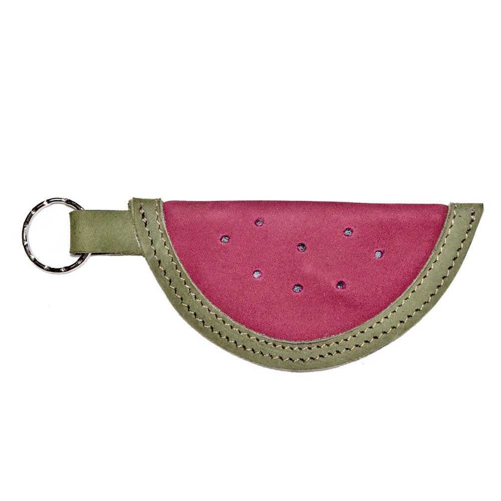 The smooth side view of the Watermelon Keychain by Hide & Drink, showcasing its delightful watermelon shape. This adorable charm is made from premium full grain leather, ensuring durability through small batch production techniques. A perfect gift for anyone who loves unique accessories, handmade in La Antigua Guatemala & Oaxaca, Mexico.