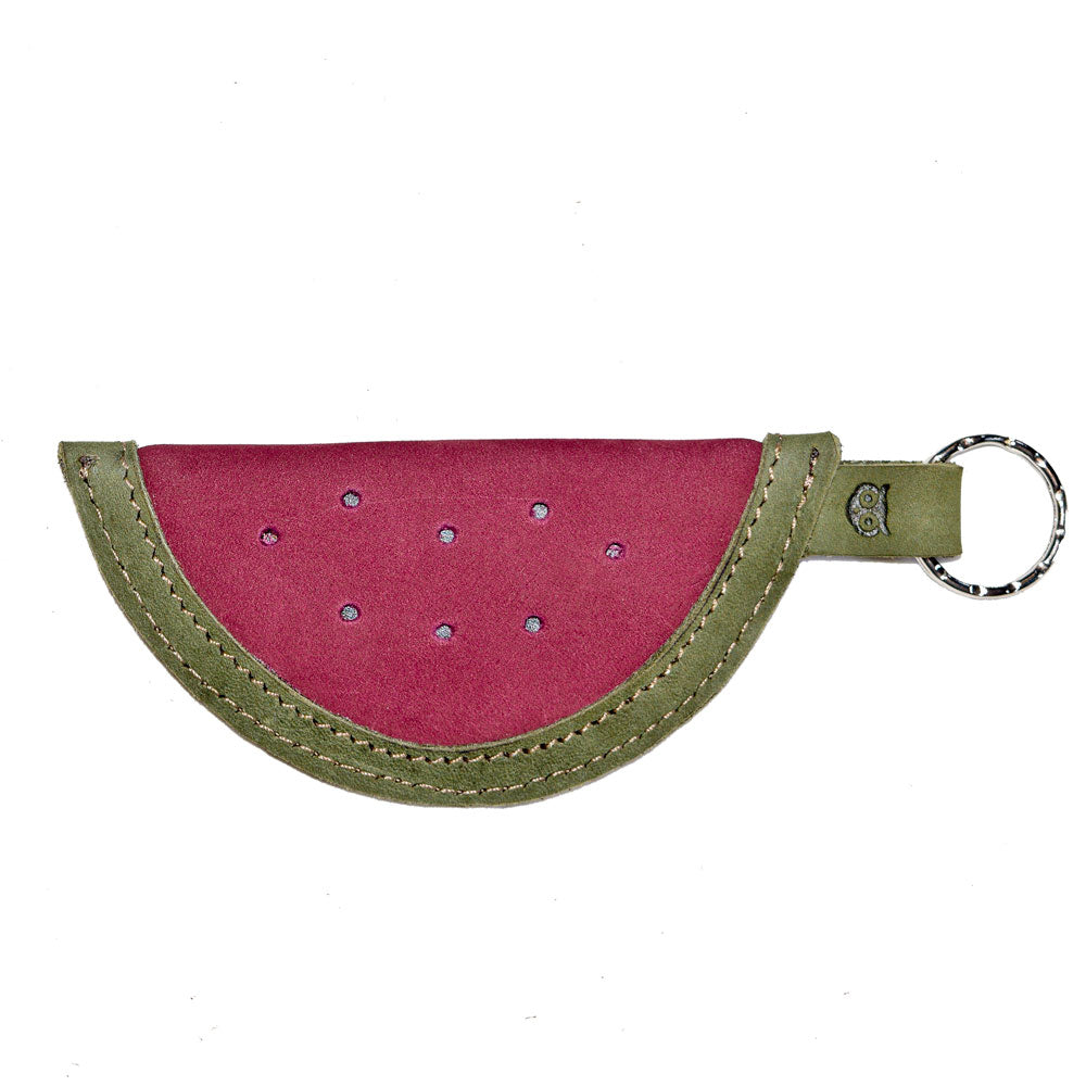 An elegant Watermelon Keychain designed by Hide & Drink, highlighting its stitch details and unique watermelon shape. This artisan key ring is crafted from luxurious full grain leather, showcasing the care of small batch production. Ideal for adding personality to your keys, made with pride in La Antigua Guatemala & Oaxaca, Mexico.