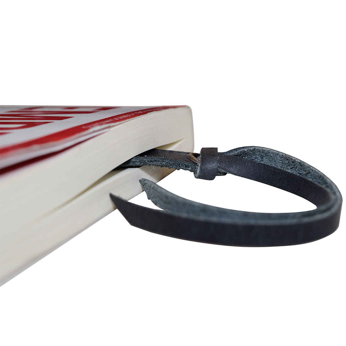 Hide & Drink Bat Bookmark peeking out from the pages of a book, demonstrating its secure and decorative functionality. A perfect gift for bookworms and comic enthusiasts, this artisan-made bookmark is hand cut and fire branded for that extra touch.