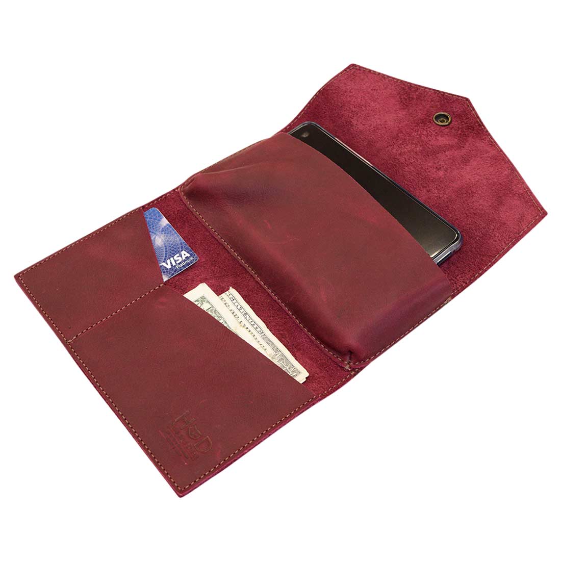Open view of burgundy Angular Wallet for Cell Phone by Hide & Drink, displaying its spacious layout for cash and phone. This artisan-quality Full Grain Leather Cell Phone Wallet represents handmade excellence from La Antigua Guatemala & Oaxaca Mexico.