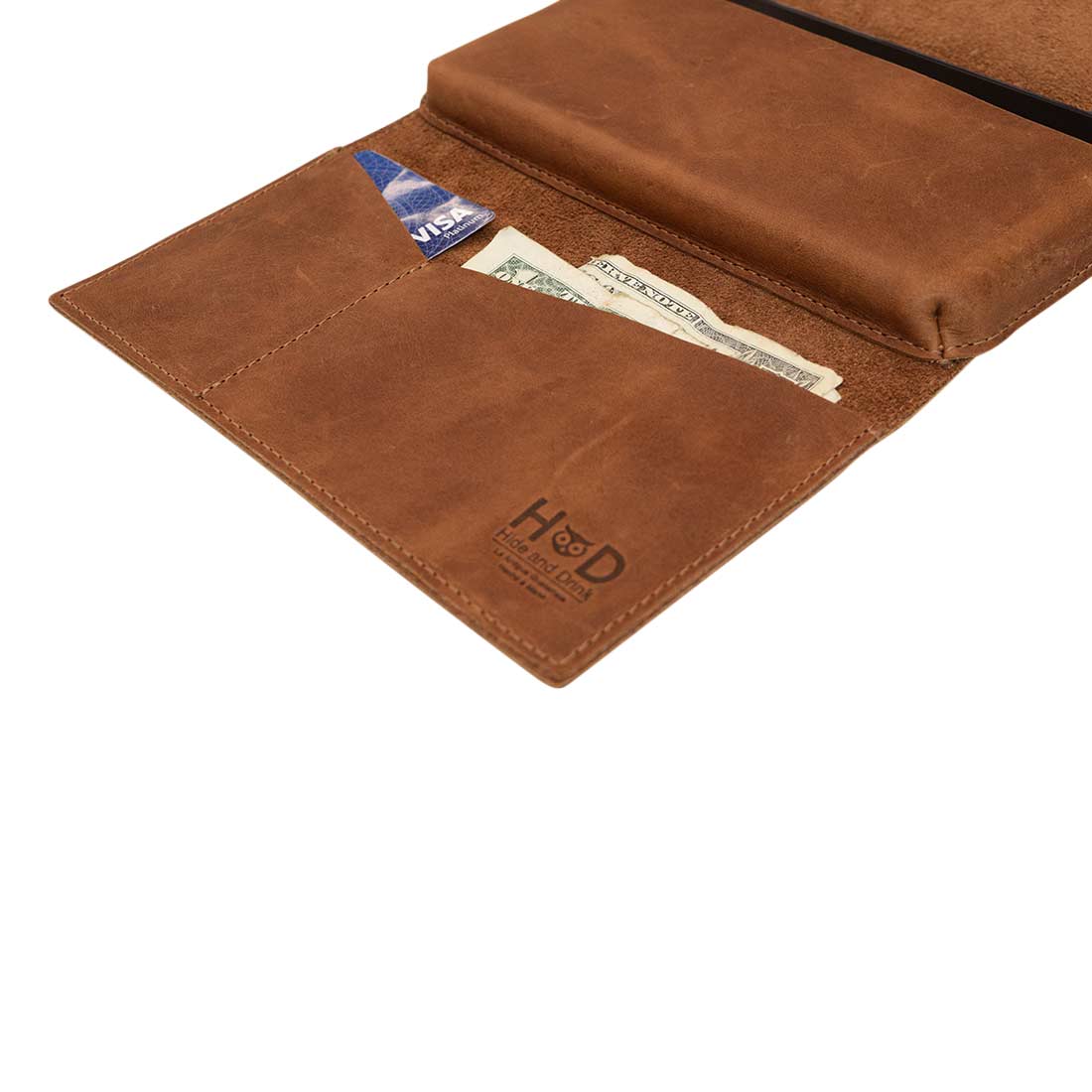 Angular Wallet for Cell Phone by Hide & Drink open to reveal its organized compartments for cash and cards, crafted from Full Grain Leather. This Cell Phone Wallet embodies artisanal techniques, hand cut and hand sewn in La Antigua Guatemala & Oaxaca Mexico.
