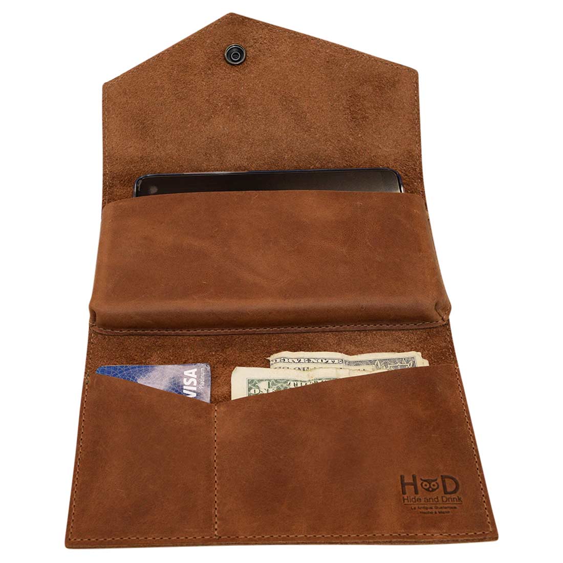 Angular Wallet for Cell Phone by Hide & Drink displayed with cash and cards, made from premium Full Grain Leather. This Cell Phone Wallet combines utility with artisan craftsmanship, highlighting small batch production from La Antigua Guatemala & Oaxaca Mexico.