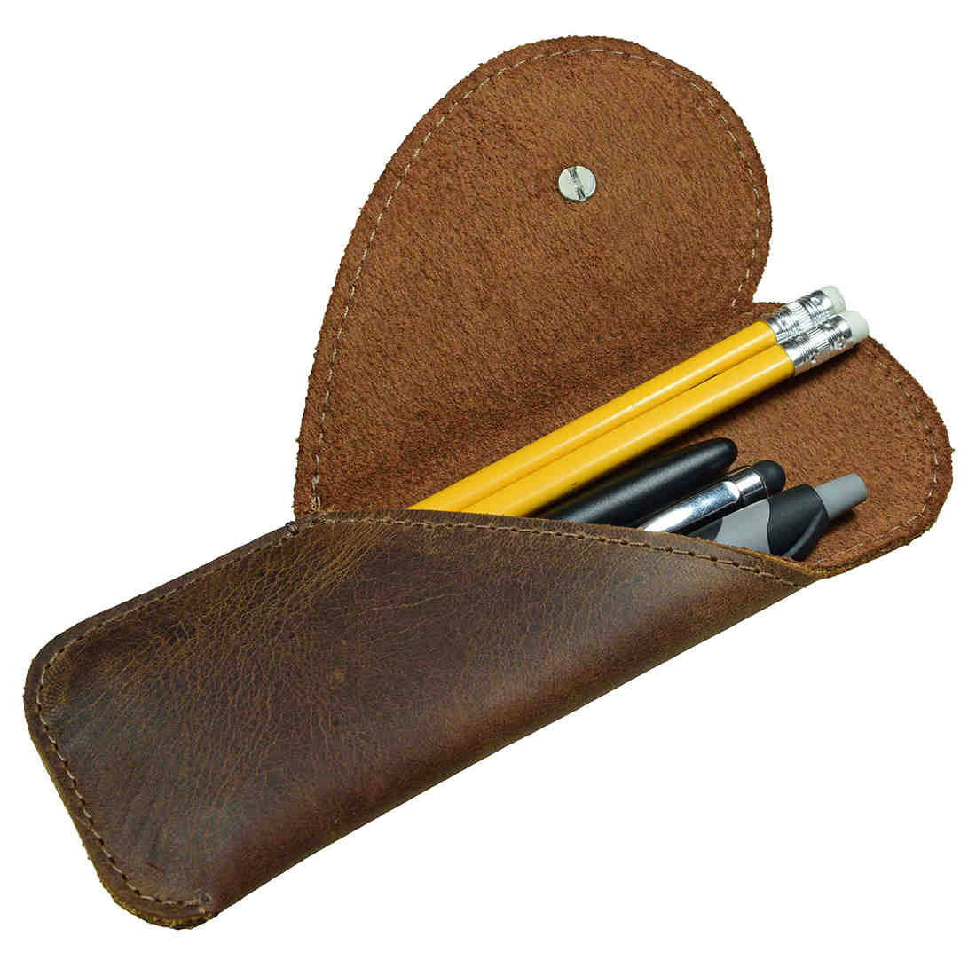 Stylish Heart Pen Case by Hide & Drink, beautifully showcasing the leather craftsmanship, ideal for organizing pencils and pens as a Pencil Organizer. Perfect for office accessories and as a thoughtful gift for bookworms, made from Full Grain Leather through small batch production, hand cut and sewn by skilled artisans in La Antigua Guatemala & Oaxaca Mexico.