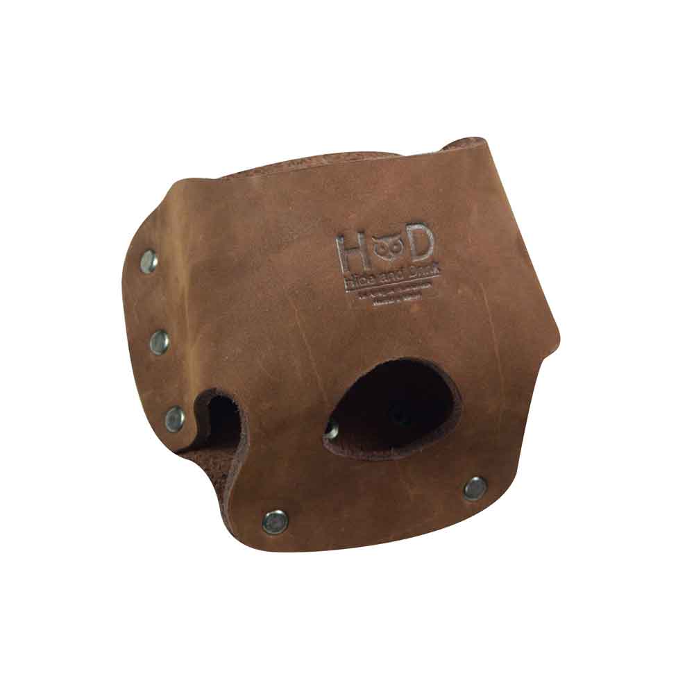 Close-up of Hide & Drink's Large Tape Holster in red, showcasing its stylish and durable design. Ideal for tradespeople requiring quick access to a Large Tape Measure.