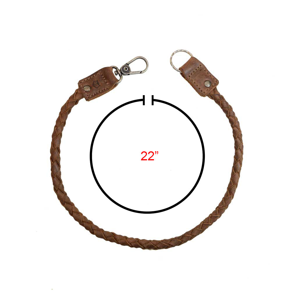 Biker Chain by Hide & Drink showcasing a braided design with a length of 22 inches, ideal for use as a key lanyard for wallet. This rustic keychain is made from durable full grain leather, emphasizing the quality of small batch production, artisan handcrafted in La Antigua Guatemala & Oaxaca Mexico.