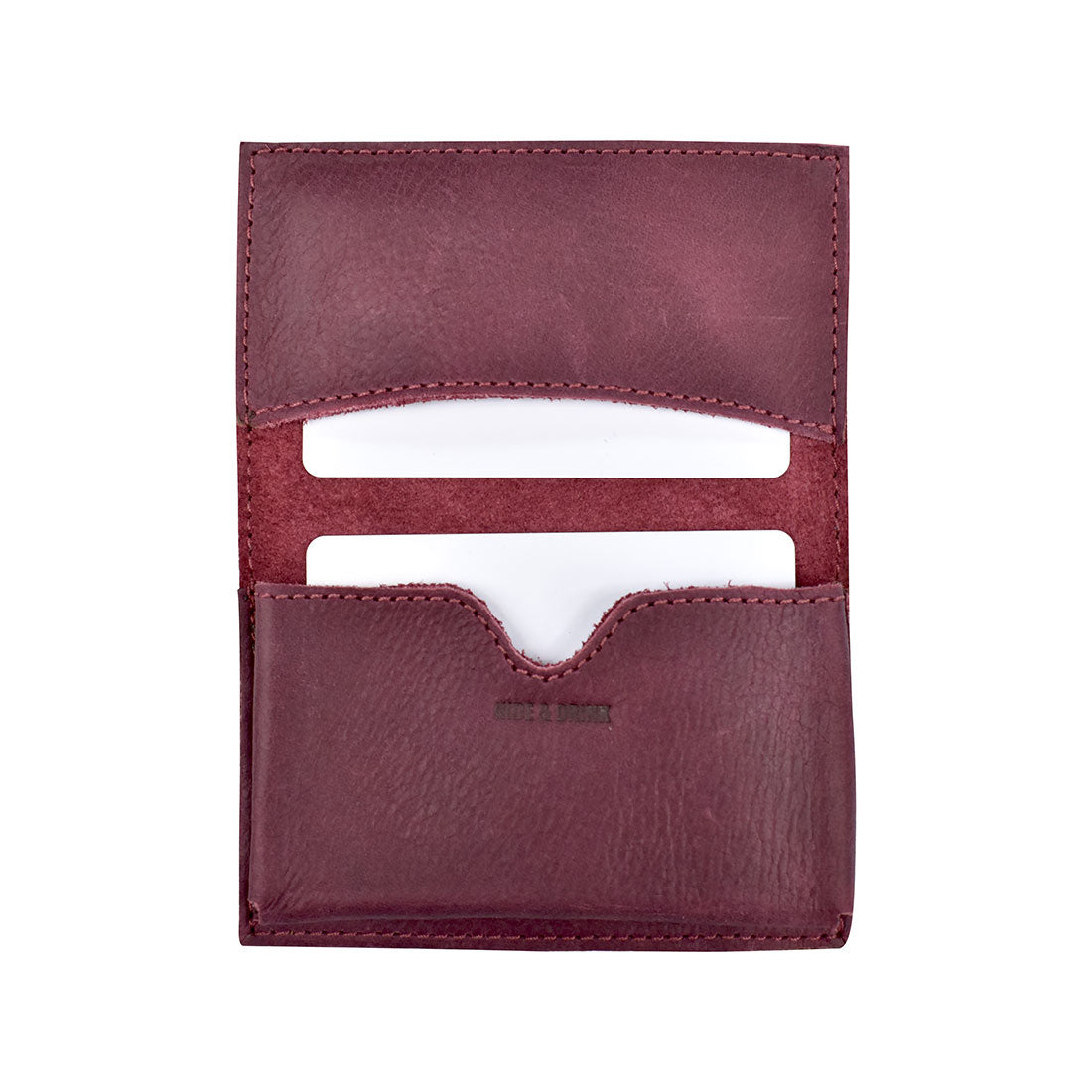 Front view of Hide & Drink's Vintage Card Holder in unique earthy tones, showcasing rustic charm. This wallet not only acts as a vintage business card holder but also a cash organizer, all crafted by artisans using full grain leather in La Antigua Guatemala & Oaxaca Mexico.