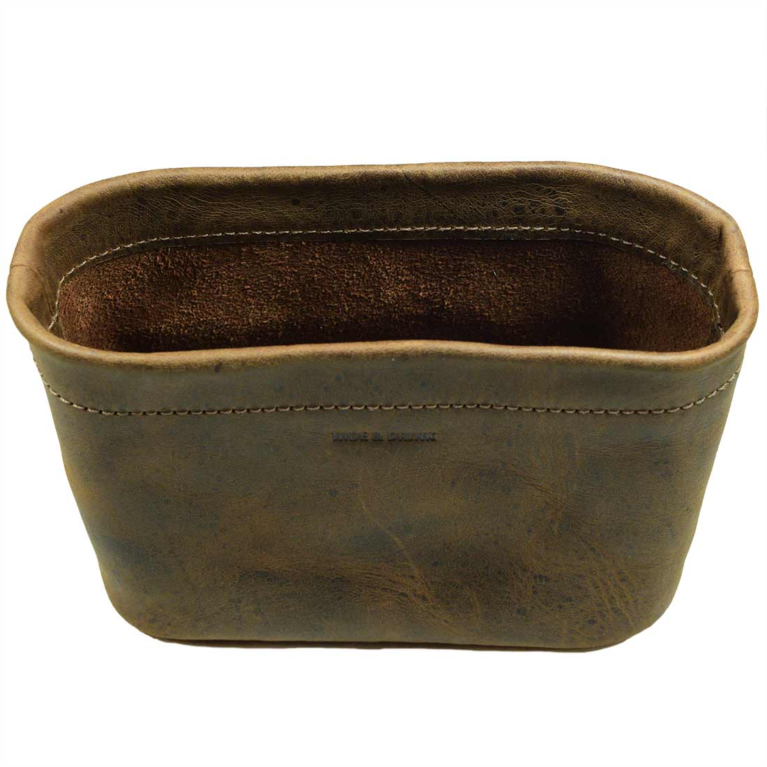 The interior of the Hide & Drink Desk Organizer Bag, made from high-quality Full Grain Leather, designed for organizing office supplies. This handmade accessory is a great addition to your desk, emphasizing artisan craftsmanship from La Antigua Guatemala & Oaxaca Mexico.