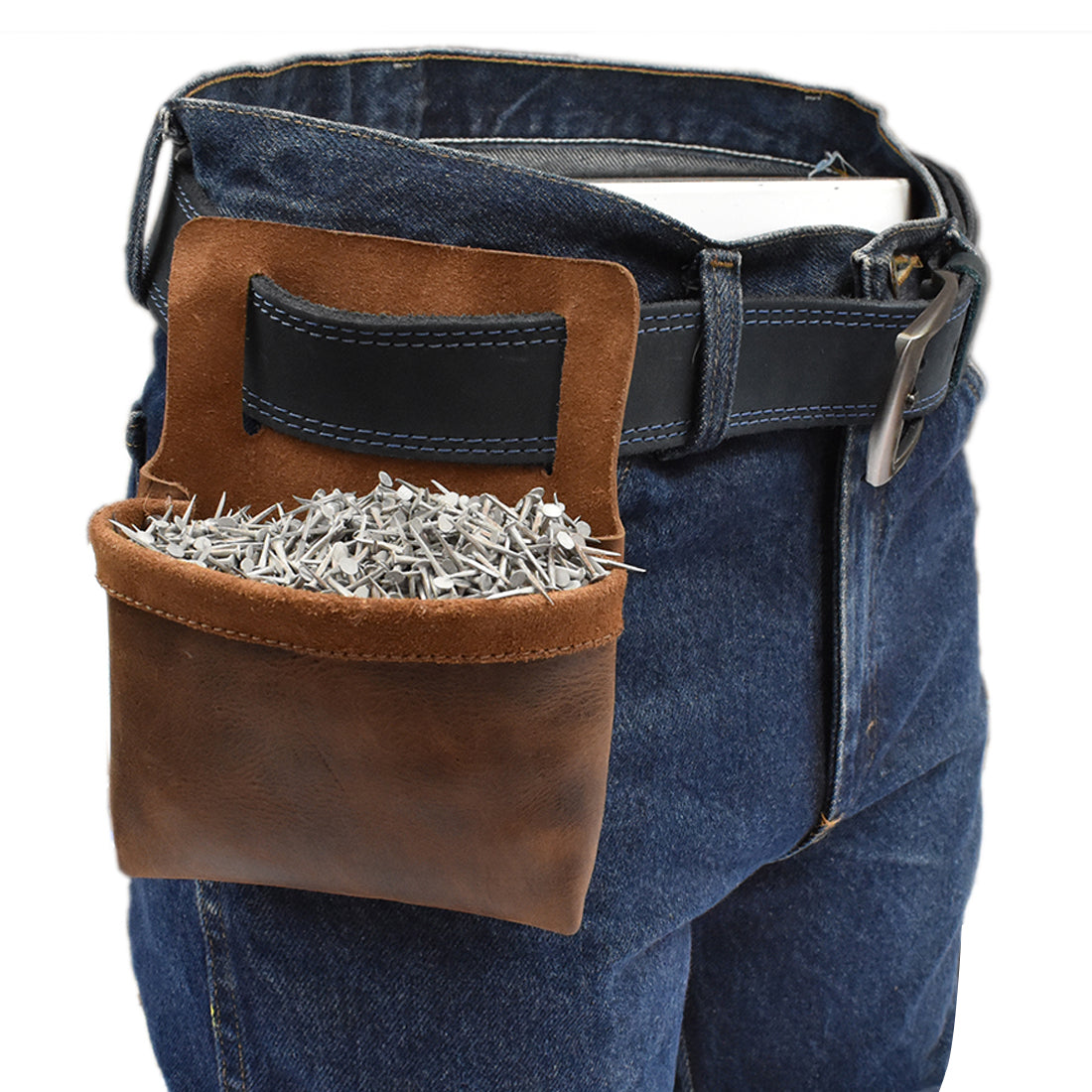 The practical Small Nail Holder by Hide & Drink shown attached to a belt, loaded with nails for convenient access. Made from Full Grain Leather, this Hardware Pouch is an essential tool for woodworkers, reflecting artisan craftsmanship from La Antigua Guatemala. With small batch production quality, each piece is hand cut and hand sewn, perfect for anyone serious about their craft.