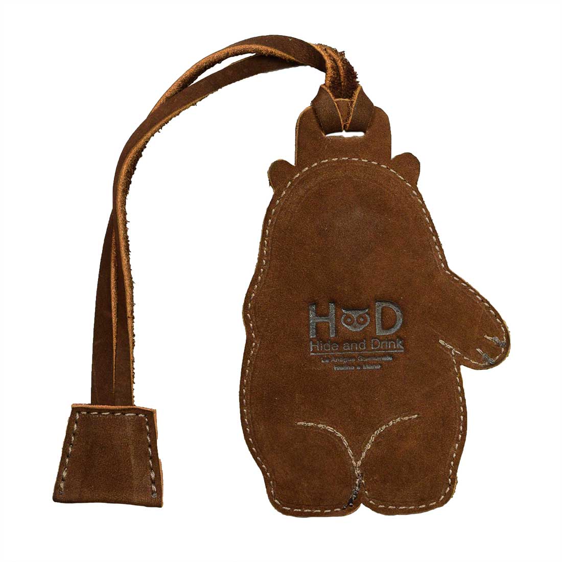 Back view of the Bear Luggage Tag by Hide & Drink, featuring the embossed logo. This charming baggage label and suitcase identifier is crafted from full grain leather, representing small batch production, and handcrafted details. Perfect travel essentials for unique style, handmade in La Antigua Guatemala & Oaxaca Mexico.
