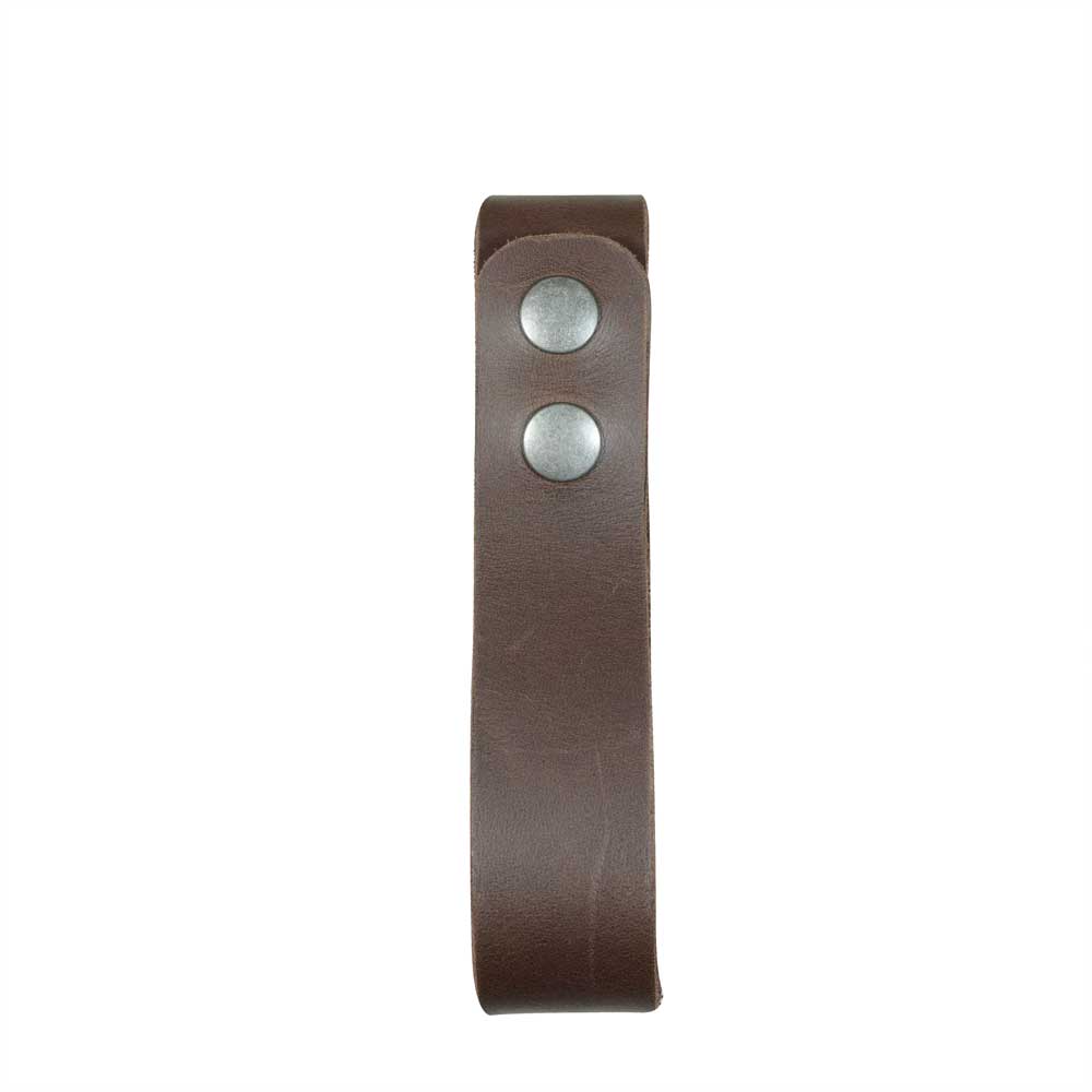 Thick Whip Holster by Hide & Drink, displaying a sleek and practical design, ideal for cowboys as a whip holster or a belt loop bullwhip holder. This rustic strap is hand crafted from thick full grain leather, representing small batch production and artisan craftsmanship in La Antigua Guatemala and Oaxaca Mexico.