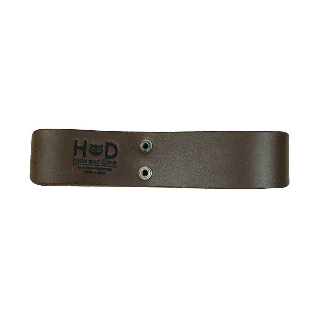 Thick Whip Holster by Hide & Drink, showing durability in a classic design, designed for cowboys as a whip holster or belt loop bullwhip holder. This rustic strap is handcrafted from thick full grain leather, representing artisan quality through small batch production, made in La Antigua Guatemala and Oaxaca Mexico.