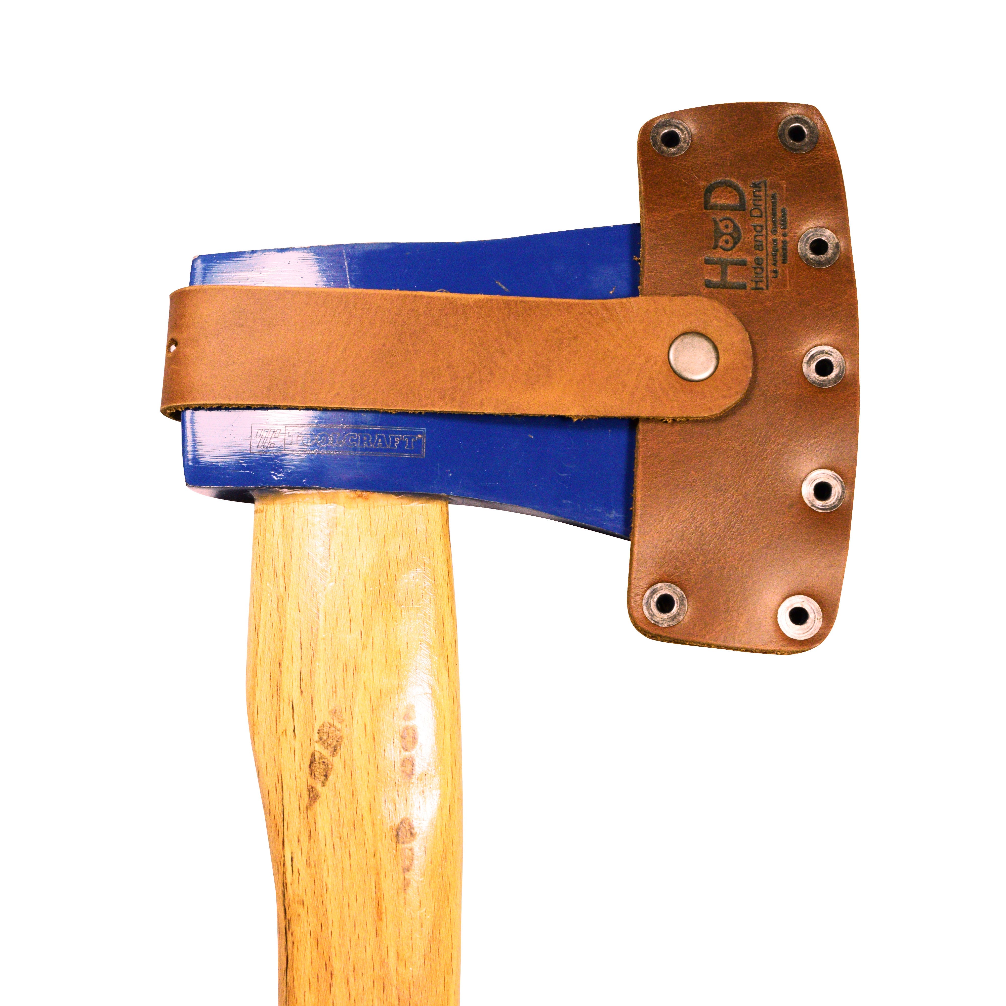 Lumberjack Axe Sheath from Hide & Drink demonstrates the quality of full grain leather in its rustic design. With an adjustable strap for convenience, this protector holster showcases artisan craftsmanship from Guatemala.