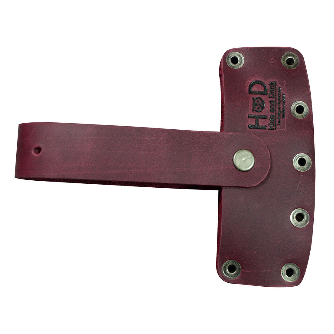 The Hide & Drink Lumberjack Axe Sheath featuring an adjustable strap for utility and style. Made from durable full grain leather, this rustic protector holster reflects small batch artisan craftsmanship.