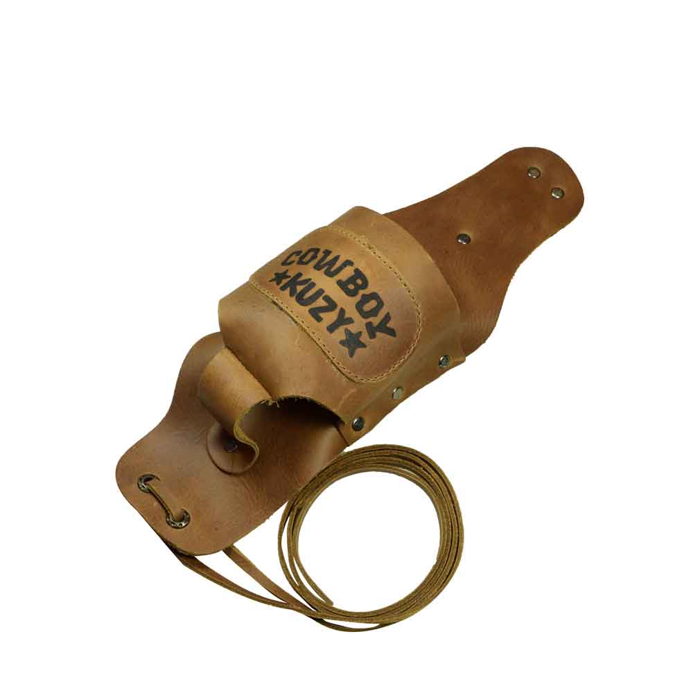 Hide & Drink Beer Holster Cowboy Buzy, the go-to Beer Holster for Cowboy that allows you to keep your beverage handy. This hands-free Western Bottle Leg Grip is made from high-quality full grain leather, highlighting small batch production and craftsmanship from La Antigua Guatemala.