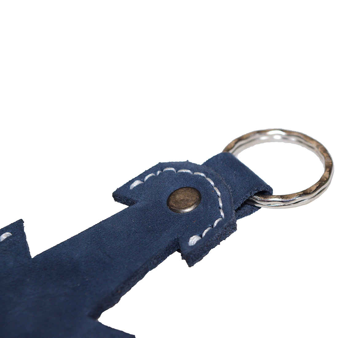 Detailed shot of the Anchor Keychain by Hide & Drink, highlighting its suede leather finish and craftsmanship. A perfect gift for sailors and travelers, this key ring is handmade from Full Grain Leather through small batch production methods, crafted with care in La Antigua Guatemala & Oaxaca Mexico.