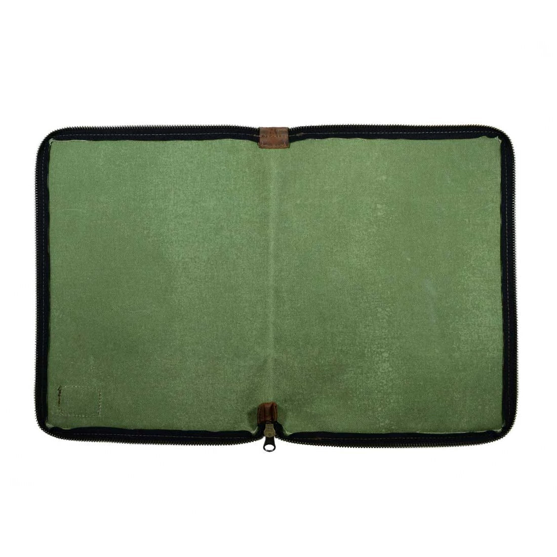 The inside of the Waxed Canvas Zippered Journal Cover for Moleskine (Notebook NOT Included) by Hide & Drink, featuring a soft green lining and a stylish design. Ideal for Cahier Cases, it combines Full Grain Leather craftsmanship with artisan dedication from La Antigua Guatemala & Oaxaca Mexico.