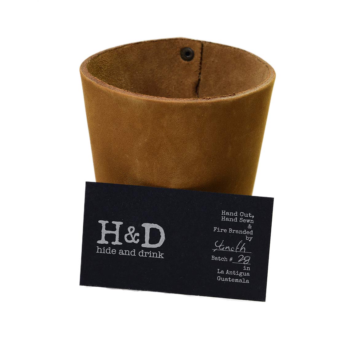 Sophisticated Pint Sleeve with Handle by Hide & Drink presented in a rich color. Handcrafted from Full Grain Leather, this artisan piece combines elegance and functionality for a premium drinking experience.