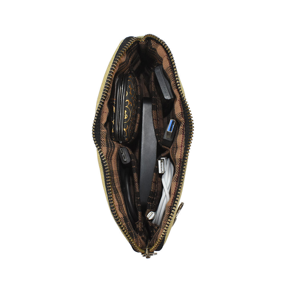 Top view of Hide & Drink's Zipper Gear Pouch filled with various items, highlighting its functional design and water resistant waxed canvas material, making it a great camping bag or travel accessory.
