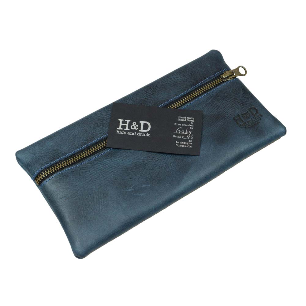 Hide & Drink Utility Cord Pouch featuring soft leather detailing. Ideal for organizing tech items, this utility & charger case for MacBook, iPad & Laptop is a must-have cable organizer and handcrafted item from La Antigua Guatemala & Oaxaca Mexico.