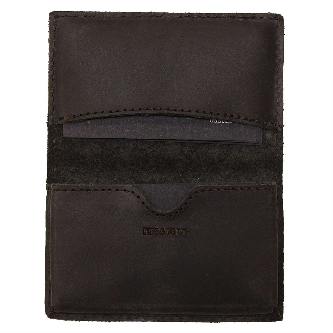 Front view of Hide & Drink's Vintage Card Holder in blue leather, representing sustainable craftsmanship. This wallet, designed for cash and business cards, showcases full grain leather and small batch production techniques from La Antigua Guatemala & Oaxaca Mexico.