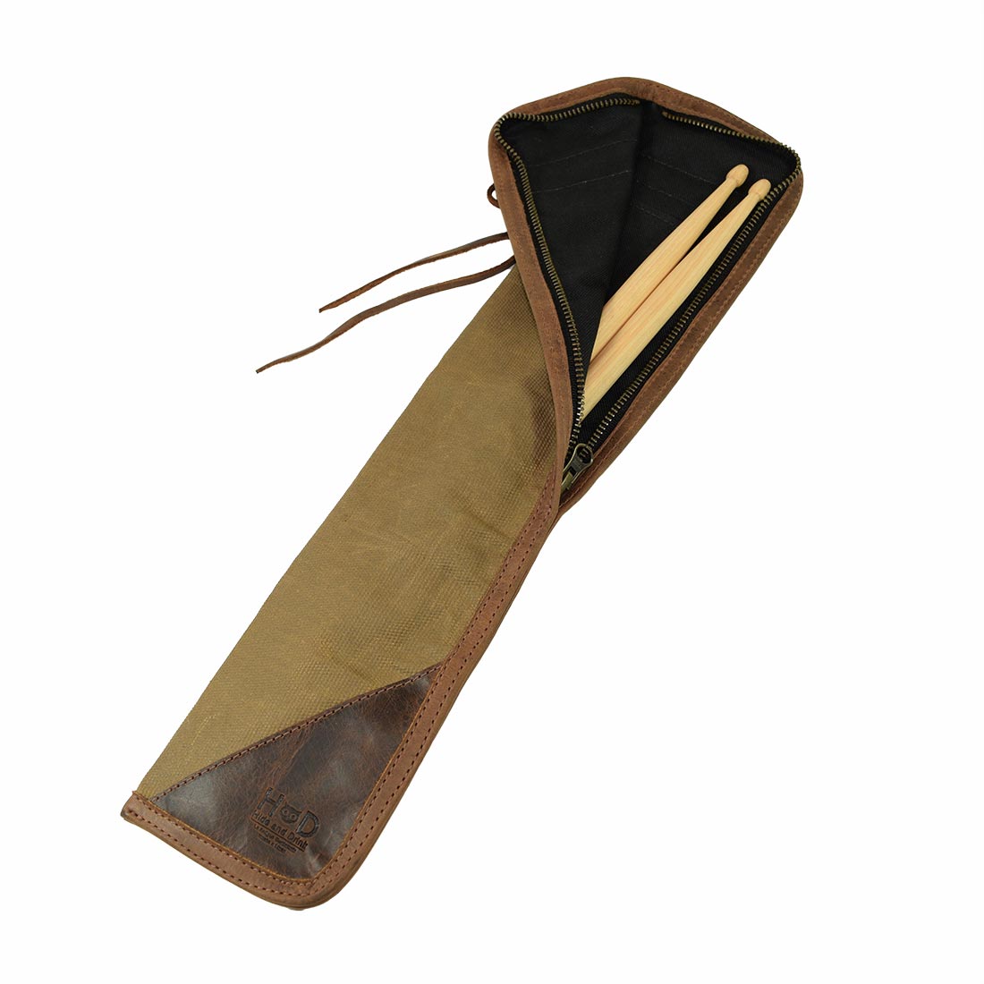 Open view of the Hide & Drink Drummstick Bag, showcasing the interior with drumsticks inside, made of Waxed Canvas & Full Grain Leather. This Drumstick Bag Holder is perfect for musicians and crafted with care featuring StockyardX small batch production techniques, hand cut and hand sewn in La Antigua Guatemala & Oaxaca Mexico.