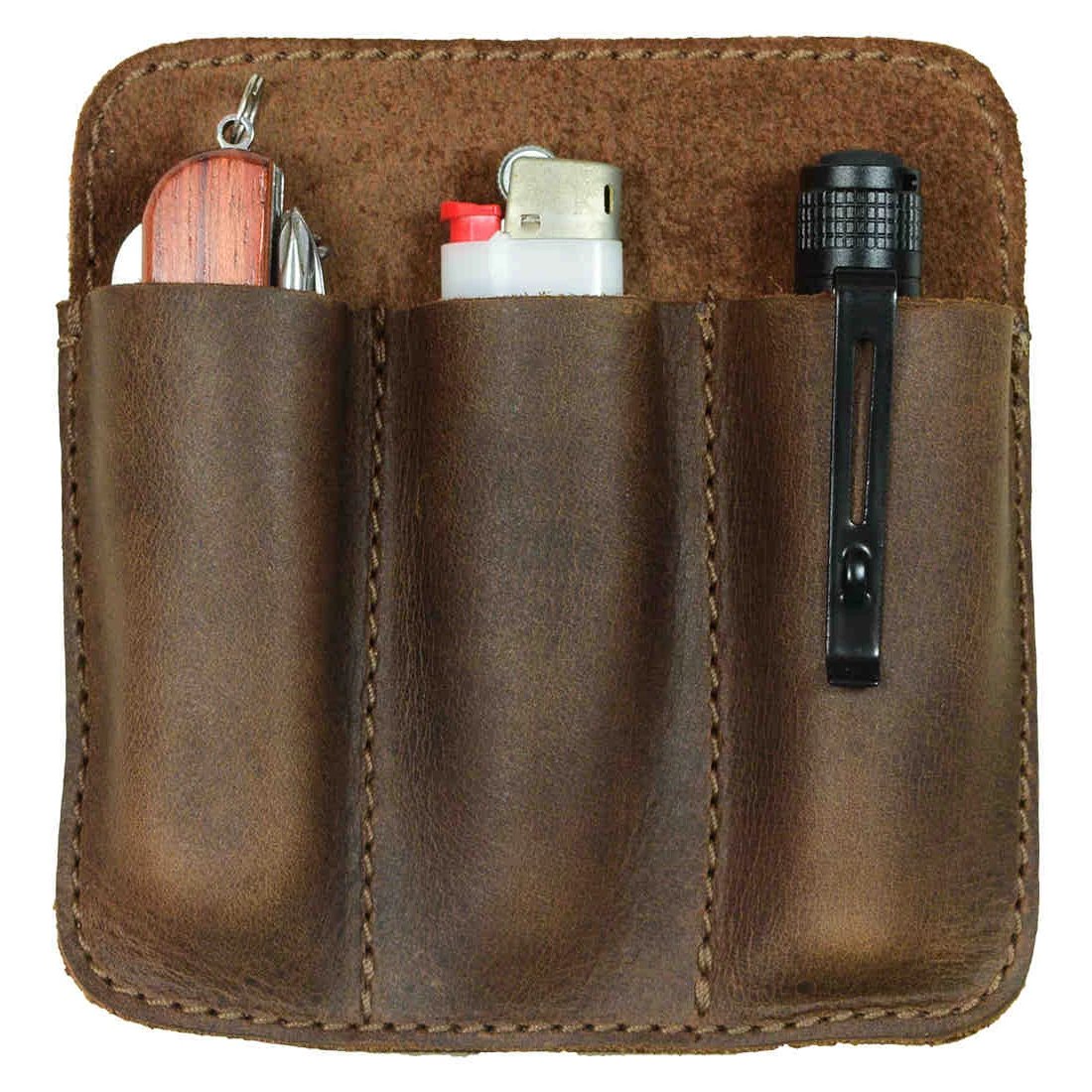 Minimalist Tool Pocket by Hide & Drink filled with everyday essentials like lighters and pens. This Full Grain Leather Tool Pocket Pouch is hand cut and sewn, providing a unique artisan touch. Handmade in La Antigua Guatemala under StockyardX's small batch production values.