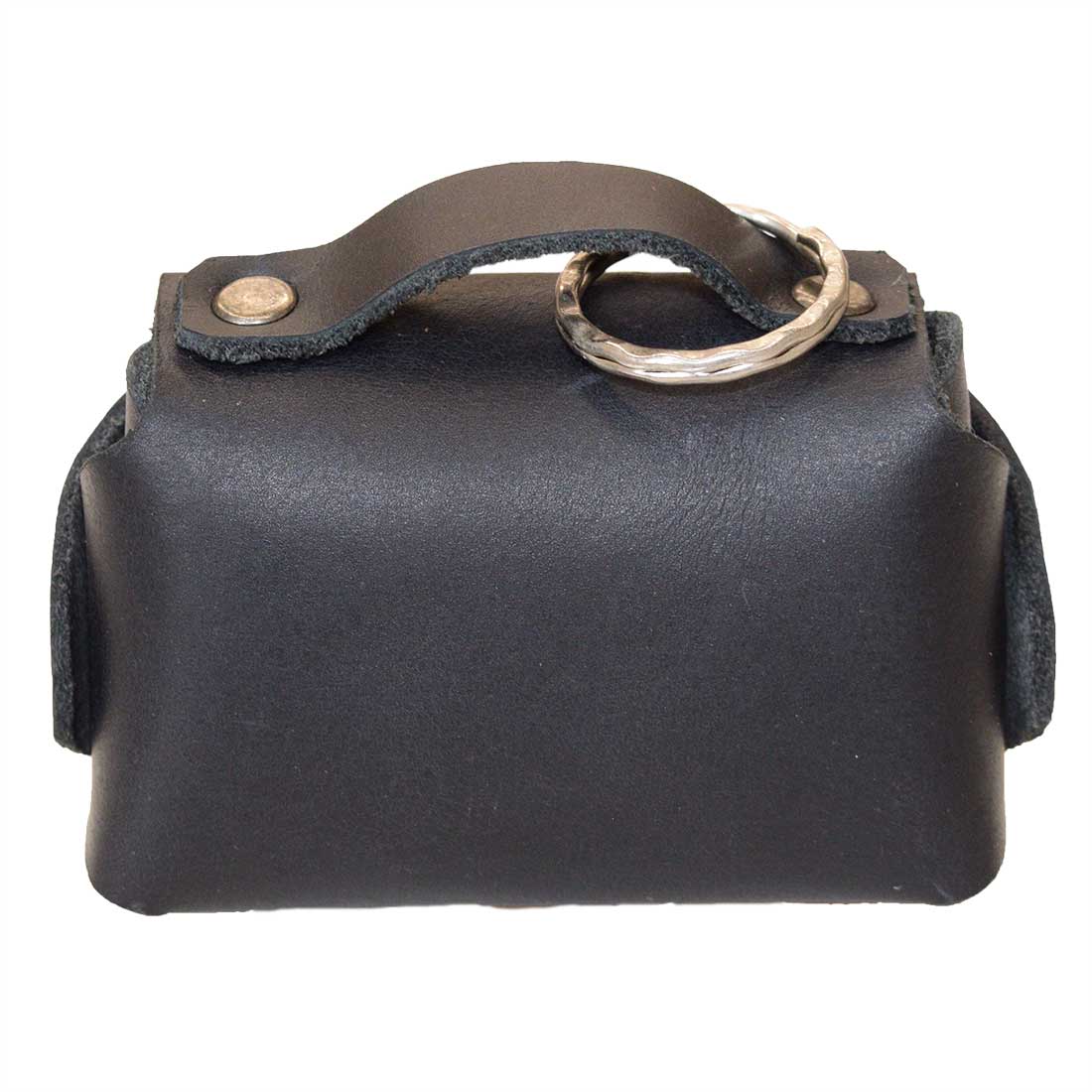Back view of the Tiny Handbag Keychain by Hide & Drink, emphasizing its sturdy black Full Grain Leather construction and key ring. This handmade piece highlights small batch production and artisan techniques from La Antigua Guatemala.