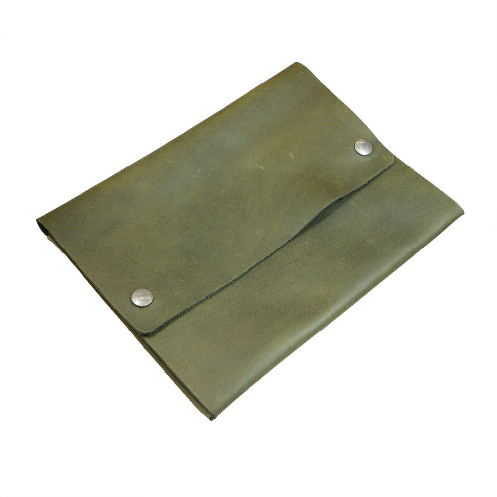 Open view of Hide & Drink's olive green Multipurpose Portfolio, featuring spacious compartments for tablets, phones, and other daily essentials, all crafted from premium Full Grain Leather. Handmade in La Antigua Guatemala & Oaxaca Mexico.