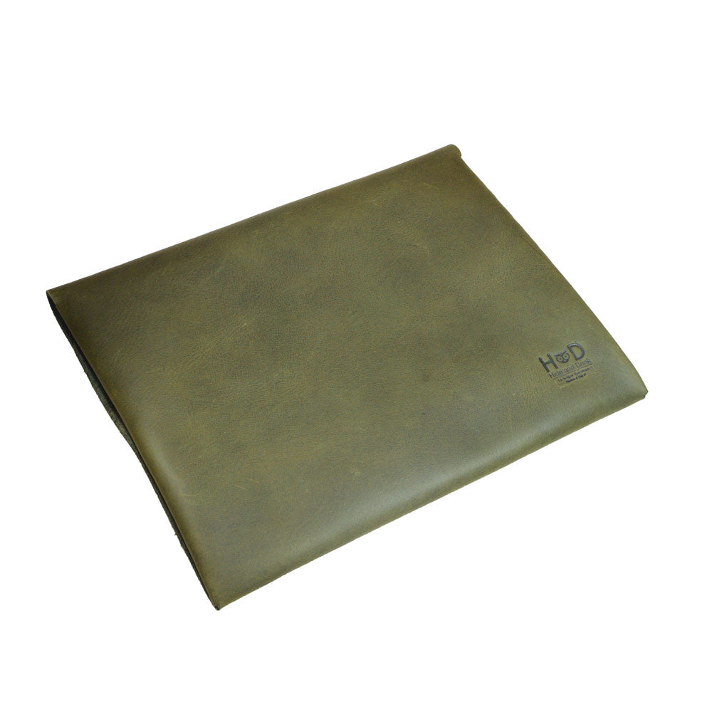 Front view of Hide & Drink's elegant olive green Multipurpose Portfolio, designed for organizing travel items and accessories, made from high-quality Full Grain Leather. Artisan handcrafted in La Antigua Guatemala & Oaxaca Mexico.