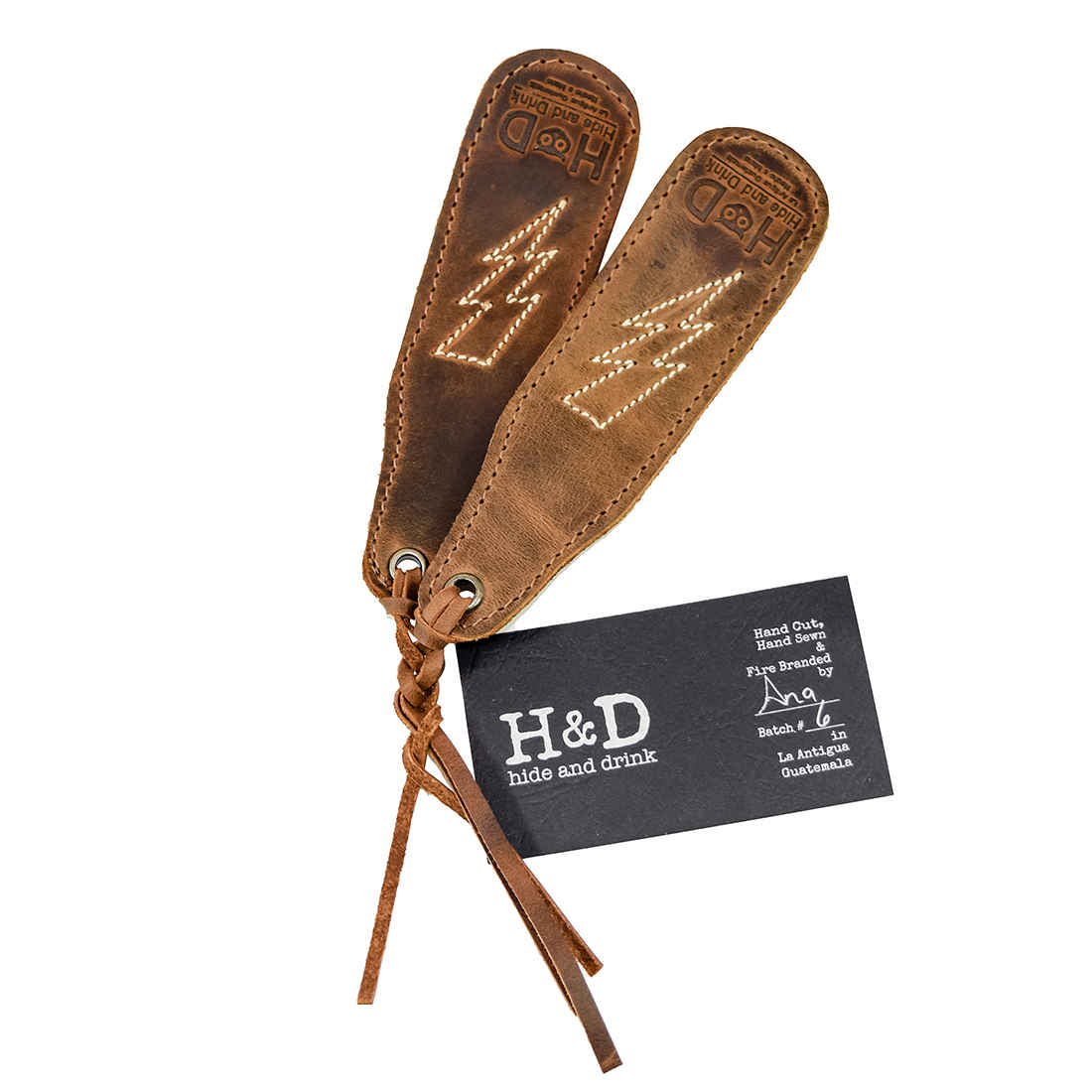 Hide & Drink Bookmark Stitched Designs (2 Pack), showcasing two bookmarks with a Thunder Potter Design in durable Full Grain Leather. Each piece represents small batch production with hand cut and hand sewn features, an ideal choice for book lovers. Crafted artisanally in La Antigua Guatemala & Oaxaca Mexico.