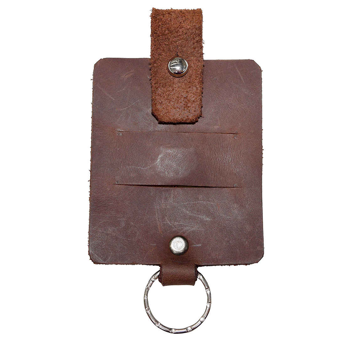 Hide & Drink Cable Holder with Key Ring, featuring a minimalist design for efficient cable organization, crafted from Thick Full Grain Leather. This stylish keychain and cord holder combines functionality with artisan quality, making it a must-have for travel. Enjoy a piece handmade in La Antigua Guatemala & Oaxaca Mexico, emphasizing small batch production.