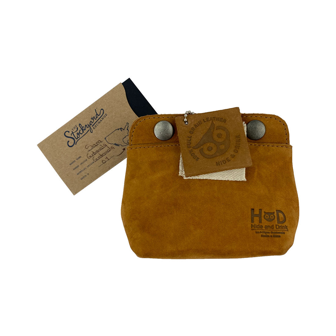 Tag showcasing the Hide & Drink Double Snap Pouch, highlighting its artisanal quality and perfect use as a cash & card holder. Handcrafted from durable full grain leather in La Antigua Guatemala.