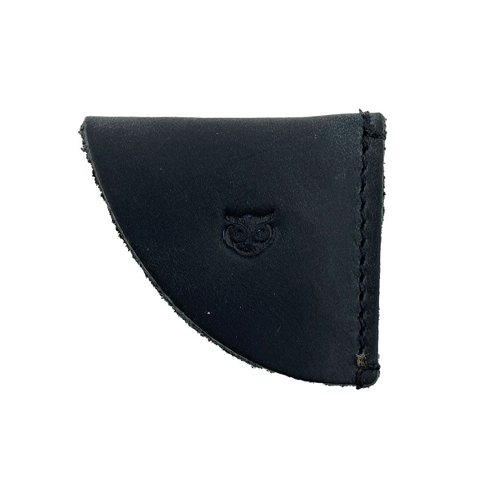 Classic black leather corner bookmark from Hide & Drink, featured in the Corner Bookmark 3-Pack, showcasing quality craftsmanship with a minimalist design. This full grain leather bookmark is ideal for enhancing your reading experience, representing artisan dedication through small batch production, hand cut, hand sewn, and fire branded, created in La Antigua Guatemala & Oaxaca Mexico.