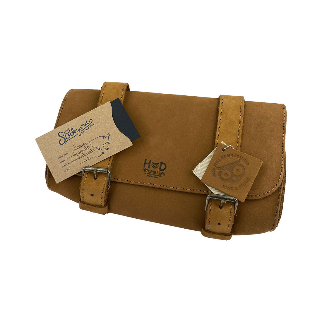 Hide & Drink Leather Motorcycle Tool Bag showcasing an artistic finish, highlighting its Full Grain Leather for those needing an effective Biker Bag for Tools and Essentials. This authentic Handlebar Bag with Adjustable Straps doubles as a helpful Tool Organizer, handcrafted in La Antigua Guatemala & Oaxaca Mexico.